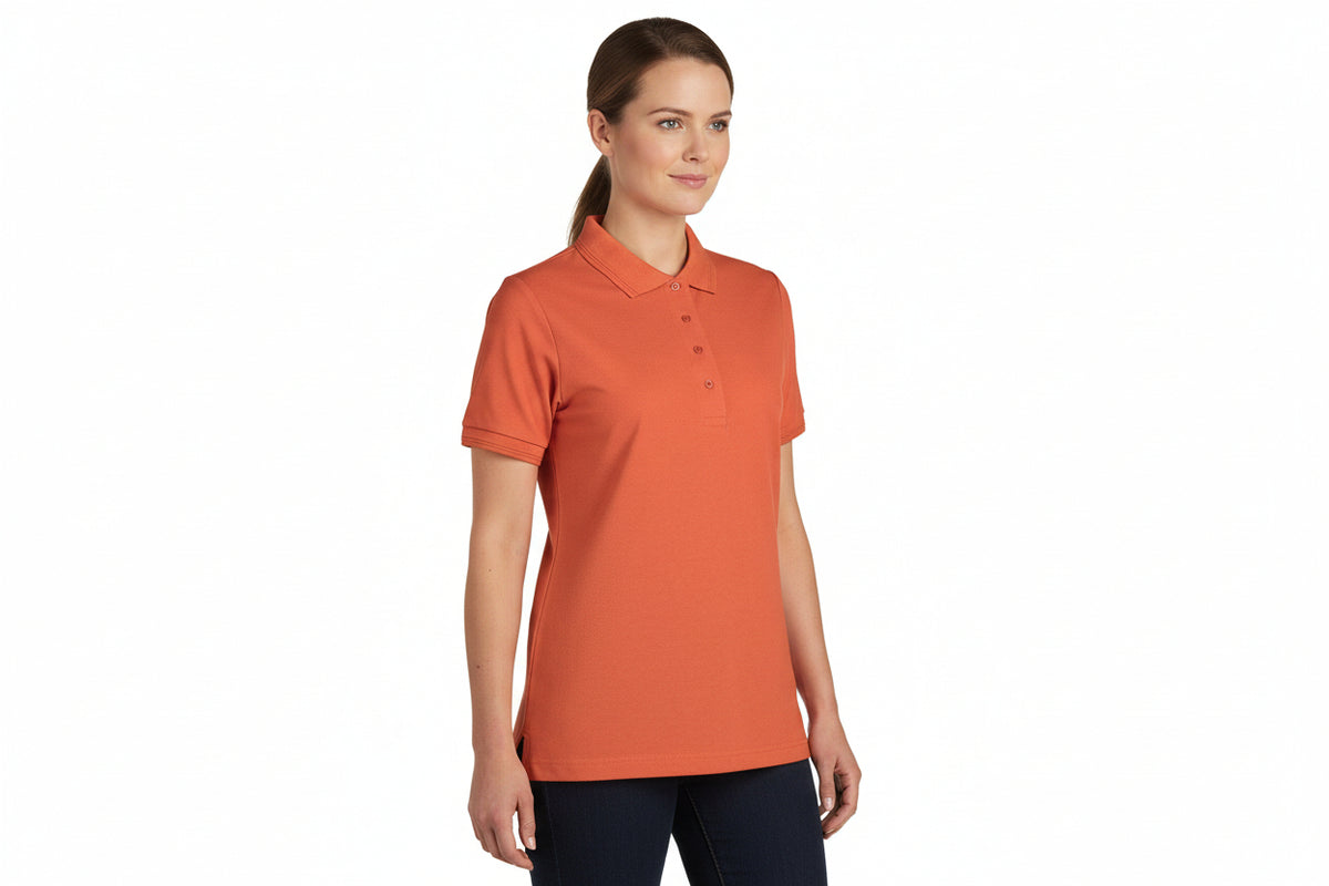 Koralfarvet dame polo t-shirt i slidstærkt materiale