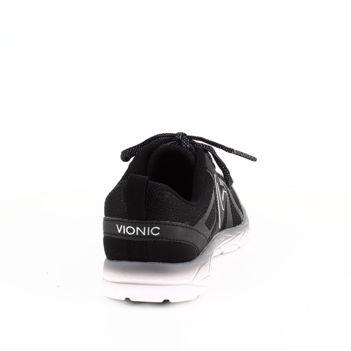 Sort sneakers fra Vionic med dobbelt svangstøtte